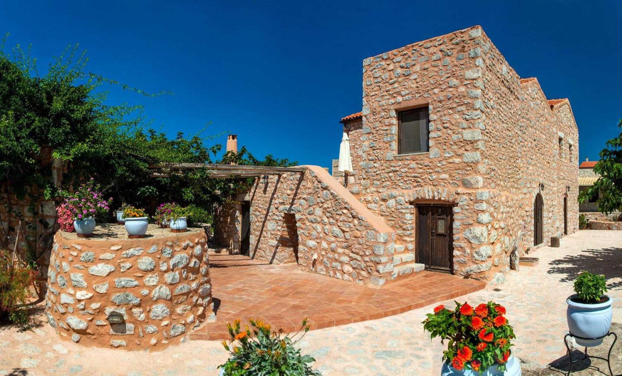 Guesthouse Toxotis Pírgos Dhiroú Bagian luar foto